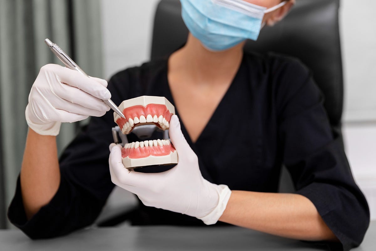 Implant Dentures: A Permanent Solution for Confident Smiles | by Dental Design of Arcadia | Medium