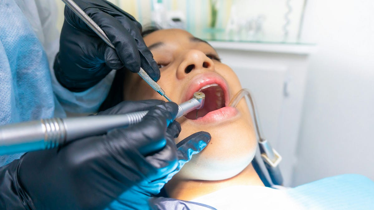 Why Choose an Implant Dentist for Your Dental Restoration Needs? | by Smilesdentalcareroselle | Oct, 2024 | Medium